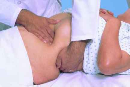 Spleen palpation in the supine position (source)